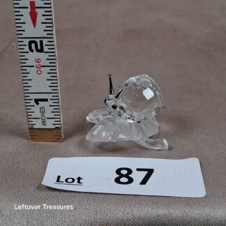 c87- Swarovski Crystal Cut Snail Figurine on Leaf